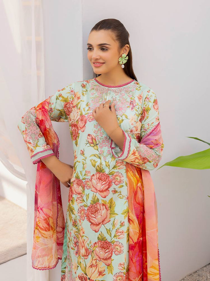 Discover the ZARIA Premium 3 Pieces Unstitched Lawn Suit, featuring digital printed lawn fabric with organza sequence embroidery. Perfect for festive occasions, this suit includes a shirt, trouser, and dupatta for a stylish and elegant look