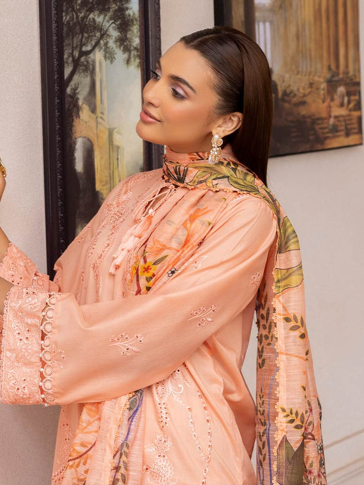 SAKURA 3 Pieces Unstitched Lawn Suit featuring an embroidered dyed luxury lawn shirt, dyed cambric cotton trousers, and a digital printed fancy lawn dupatta