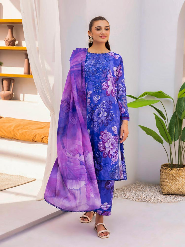 Discover the ZARIA Premium 3 Pieces Unstitched Lawn Suit, featuring digital printed lawn fabric with organza sequence embroidery. Perfect for festive occasions, this suit includes a shirt, trouser, and dupatta for a stylish and elegant look