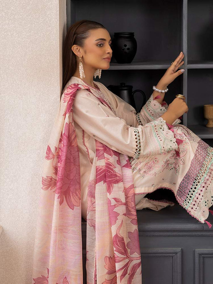 SAKURA 3 Pieces Unstitched Lawn Suit featuring an embroidered dyed luxury lawn shirt, dyed cambric cotton trousers, and a digital printed fancy lawn dupatta