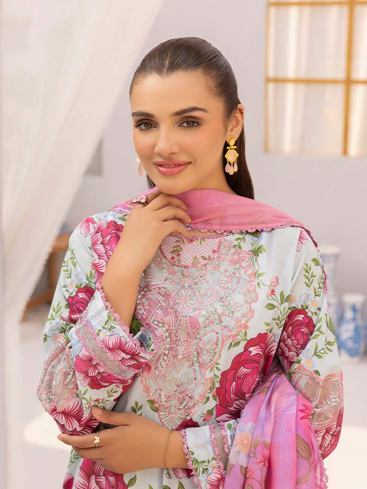 Discover the ZARIA Premium 3 Pieces Unstitched Lawn Suit, featuring digital printed lawn fabric with organza sequence embroidery. Perfect for festive occasions, this suit includes a shirt, trouser, and dupatta for a stylish and elegant look