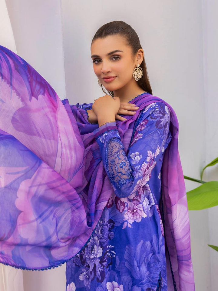 Discover the ZARIA Premium 3 Pieces Unstitched Lawn Suit, featuring digital printed lawn fabric with organza sequence embroidery. Perfect for festive occasions, this suit includes a shirt, trouser, and dupatta for a stylish and elegant look