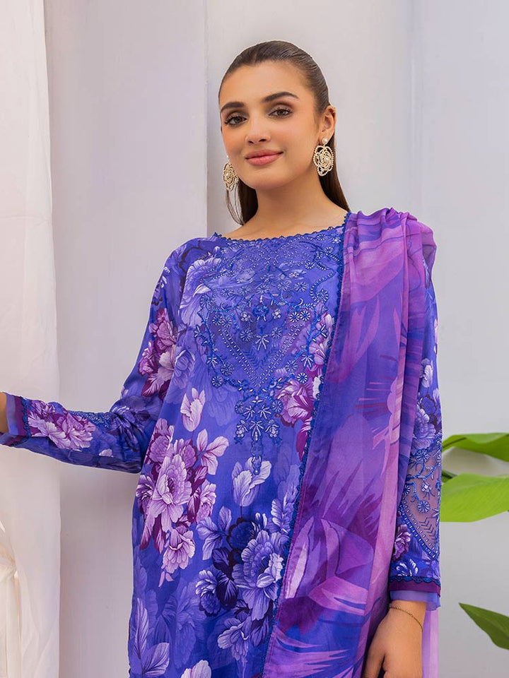 Discover the ZARIA Premium 3 Pieces Unstitched Lawn Suit, featuring digital printed lawn fabric with organza sequence embroidery. Perfect for festive occasions, this suit includes a shirt, trouser, and dupatta for a stylish and elegant look