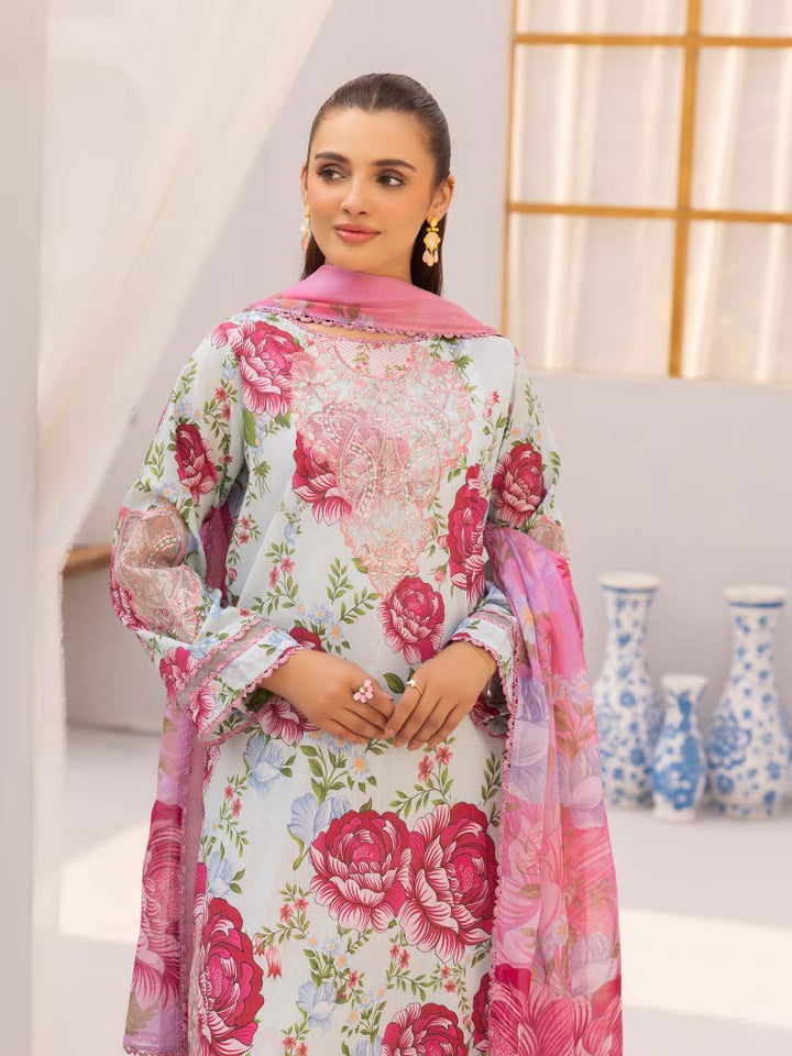 Discover the ZARIA Premium 3 Pieces Unstitched Lawn Suit, featuring digital printed lawn fabric with organza sequence embroidery. Perfect for festive occasions, this suit includes a shirt, trouser, and dupatta for a stylish and elegant look