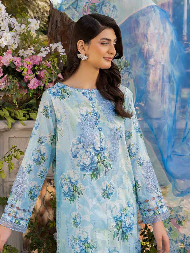 NAMAL 3 Pieces Unstitched Digital Printed Lawn Suit featuring a digital printed lawn shirt with organza embroidery, dyed cambric cotton trousers, and a bamber chiffon dupatta with embroidered cut-work details.