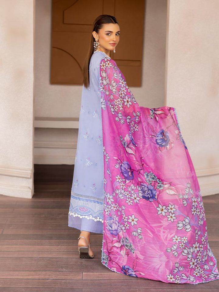 SAKURA 3 Pieces Unstitched Lawn Suit featuring an embroidered dyed luxury lawn shirt, dyed cambric cotton trousers, and a digital printed fancy lawn dupatta