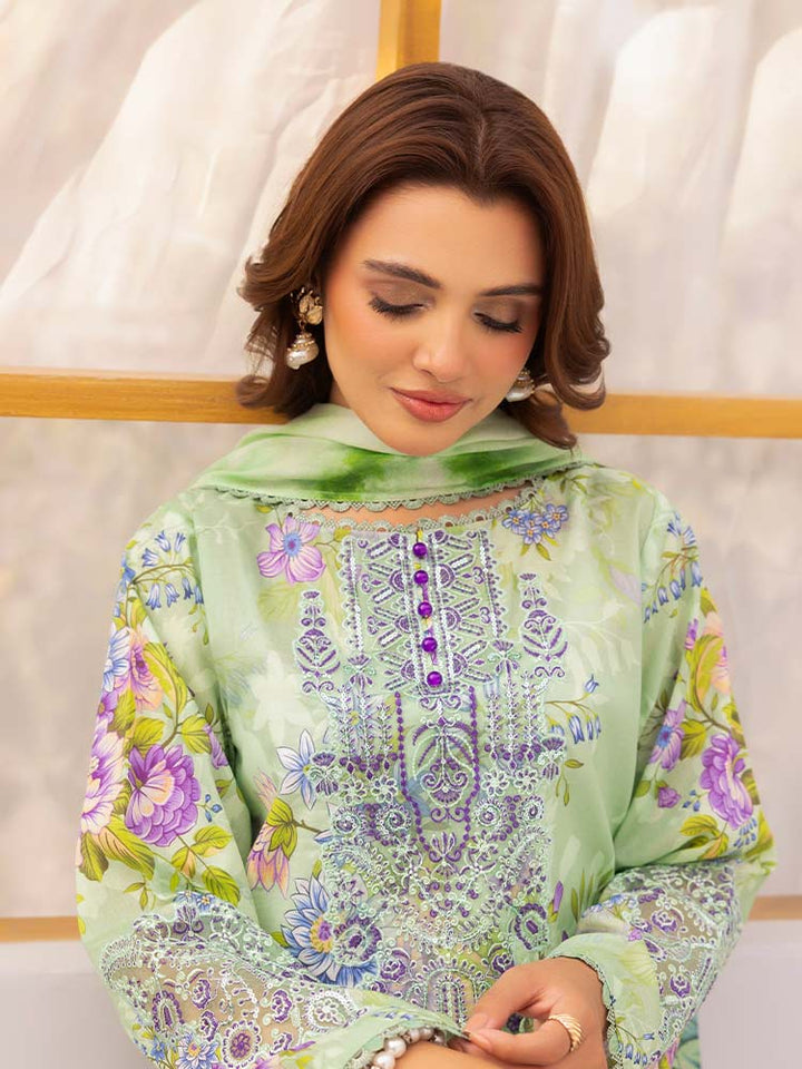 Discover the ZARIA Premium 3 Pieces Unstitched Lawn Suit, featuring digital printed lawn fabric with organza sequence embroidery. Perfect for festive occasions, this suit includes a shirt, trouser, and dupatta for a stylish and elegant look