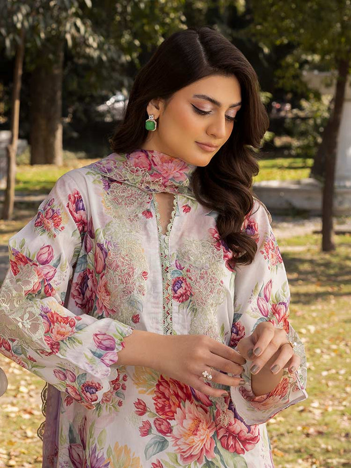 NAMAL 3 Pieces Unstitched Digital Printed Lawn Suit featuring a digital printed lawn shirt with organza embroidery, dyed cambric cotton trousers, and a bamber chiffon dupatta with embroidered cut-work details.