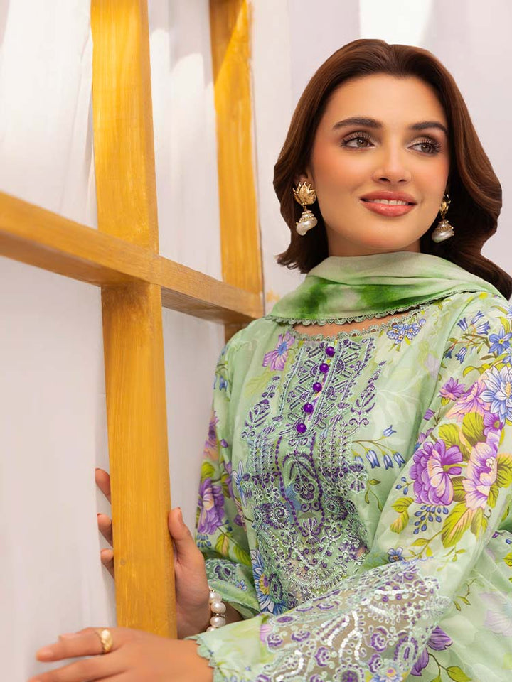 Discover the ZARIA Premium 3 Pieces Unstitched Lawn Suit, featuring digital printed lawn fabric with organza sequence embroidery. Perfect for festive occasions, this suit includes a shirt, trouser, and dupatta for a stylish and elegant look