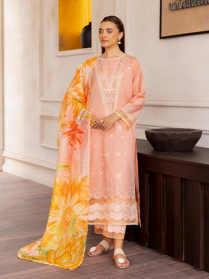 SAKURA 3 Pieces Unstitched Lawn Suit featuring an embroidered dyed luxury lawn shirt, dyed cambric cotton trousers, and a digital printed fancy lawn dupatta