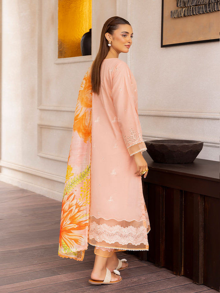 SAKURA 3 Pieces Unstitched Lawn Suit featuring an embroidered dyed luxury lawn shirt, dyed cambric cotton trousers, and a digital printed fancy lawn dupatta