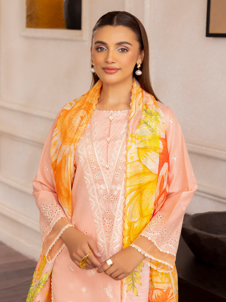 SAKURA 3 Pieces Unstitched Lawn Suit featuring an embroidered dyed luxury lawn shirt, dyed cambric cotton trousers, and a digital printed fancy lawn dupatta