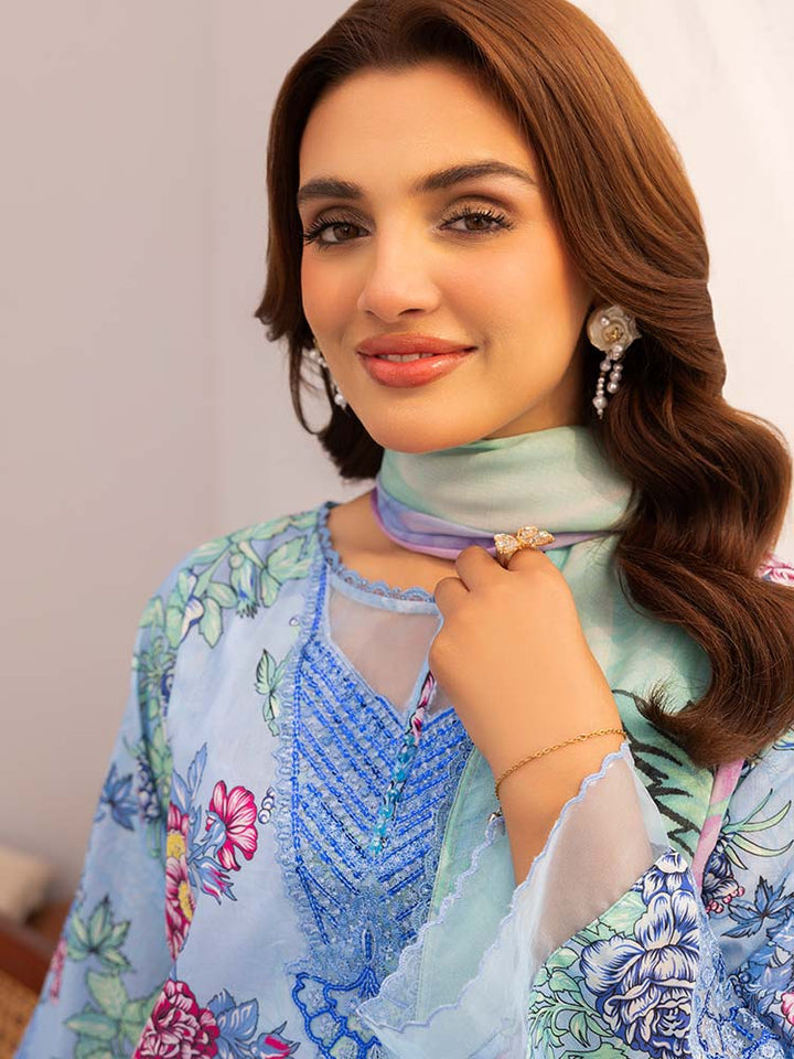 Discover the ZARIA Premium 3 Pieces Unstitched Lawn Suit, featuring digital printed lawn fabric with organza sequence embroidery. Perfect for festive occasions, this suit includes a shirt, trouser, and dupatta for a stylish and elegant look