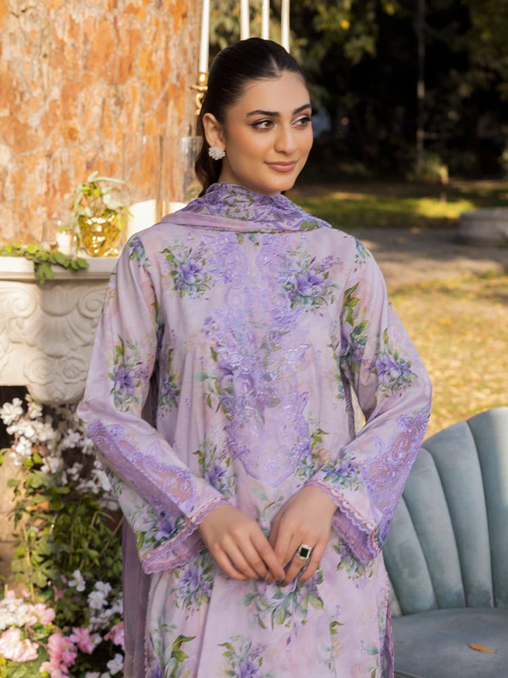NAMAL 3 Pieces Unstitched Digital Printed Lawn Suit featuring a digital printed lawn shirt with organza embroidery, dyed cambric cotton trousers, and a bamber chiffon dupatta with embroidered cut-work details.