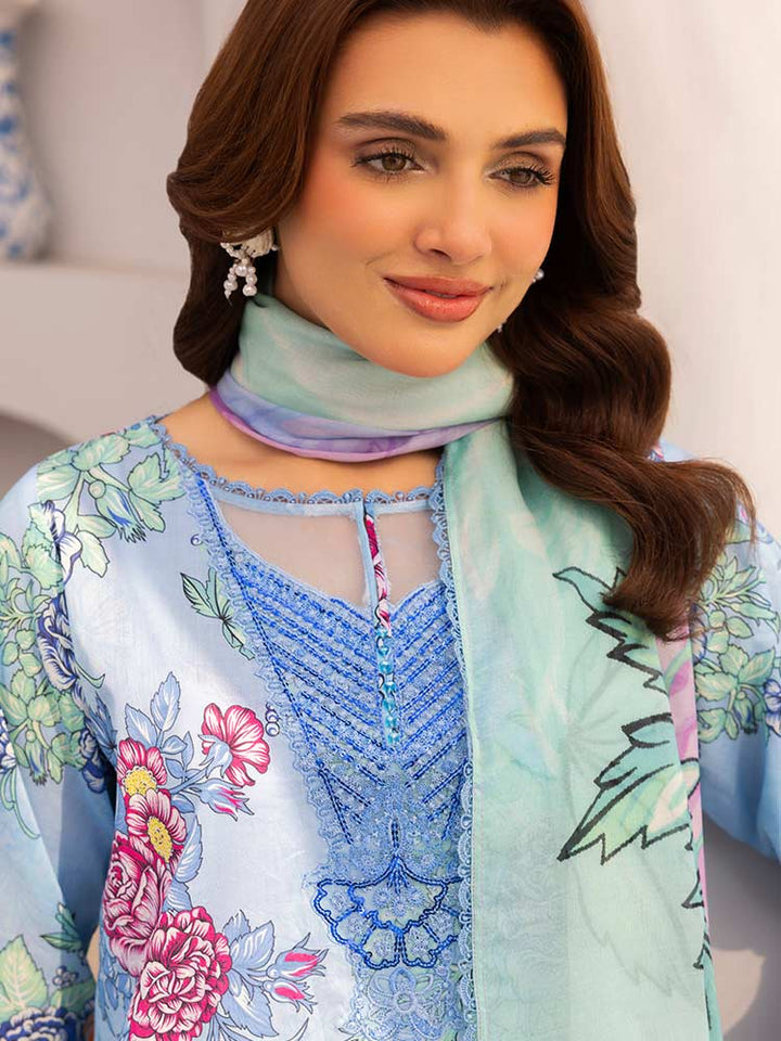 Discover the ZARIA Premium 3 Pieces Unstitched Lawn Suit, featuring digital printed lawn fabric with organza sequence embroidery. Perfect for festive occasions, this suit includes a shirt, trouser, and dupatta for a stylish and elegant look