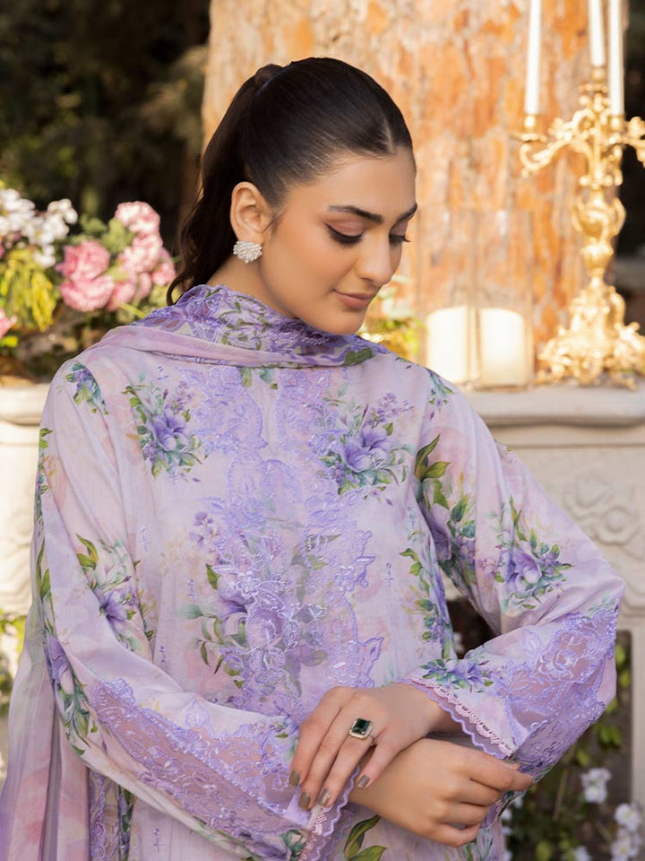 NAMAL 3 Pieces Unstitched Digital Printed Lawn Suit featuring a digital printed lawn shirt with organza embroidery, dyed cambric cotton trousers, and a bamber chiffon dupatta with embroidered cut-work details.