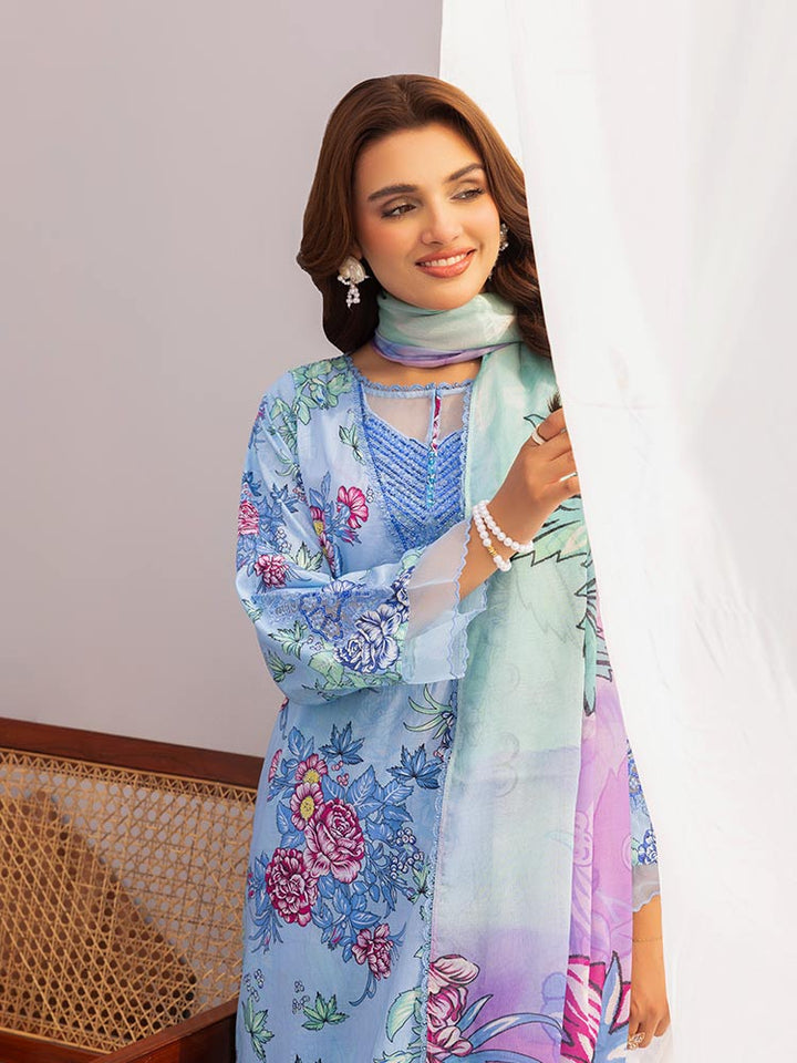 Discover the ZARIA Premium 3 Pieces Unstitched Lawn Suit, featuring digital printed lawn fabric with organza sequence embroidery. Perfect for festive occasions, this suit includes a shirt, trouser, and dupatta for a stylish and elegant look