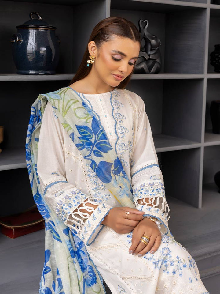 SAKURA 3 Pieces Unstitched Lawn Suit featuring an embroidered dyed luxury lawn shirt, dyed cambric cotton trousers, and a digital printed fancy lawn dupatta