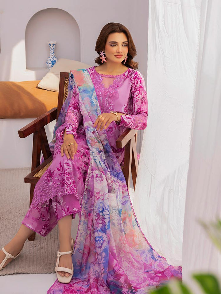 Discover the ZARIA Premium 3 Pieces Unstitched Lawn Suit, featuring digital printed lawn fabric with organza sequence embroidery. Perfect for festive occasions, this suit includes a shirt, trouser, and dupatta for a stylish and elegant look