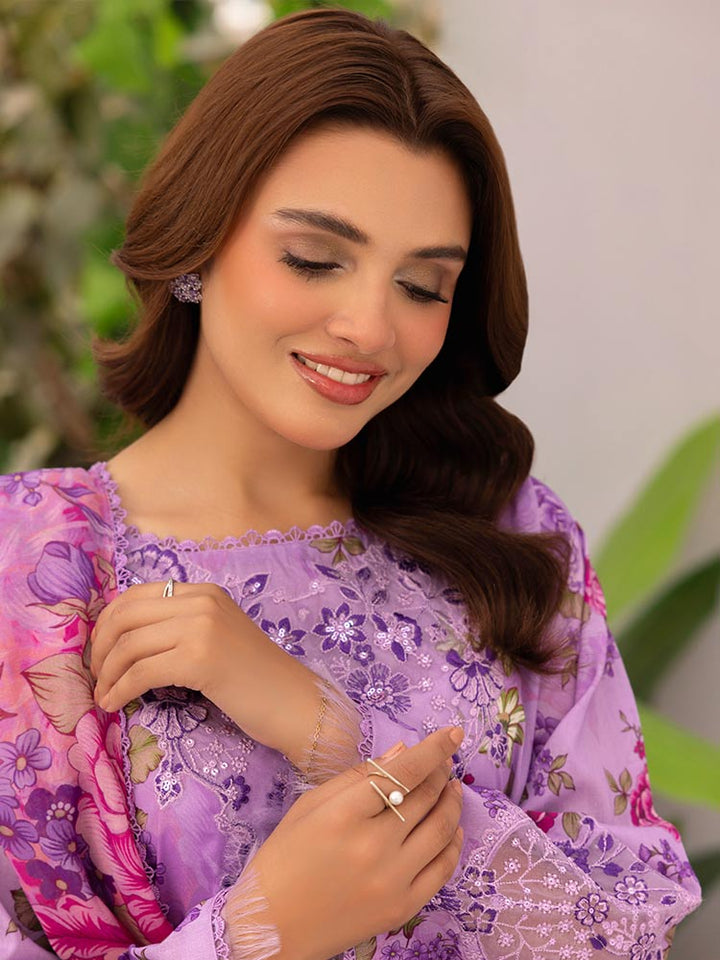 Discover the ZARIA Premium 3 Pieces Unstitched Lawn Suit, featuring digital printed lawn fabric with organza sequence embroidery. Perfect for festive occasions, this suit includes a shirt, trouser, and dupatta for a stylish and elegant look