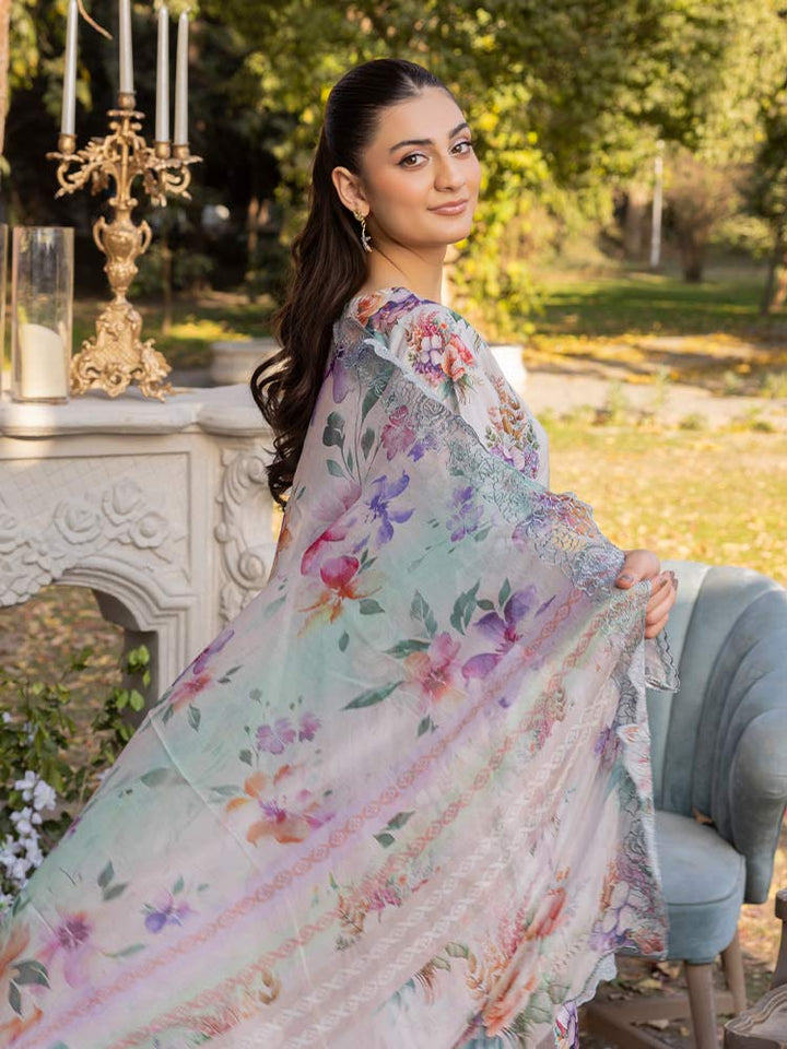 NAMAL 3 Pieces Unstitched Digital Printed Lawn Suit featuring a digital printed lawn shirt with organza embroidery, dyed cambric cotton trousers, and a bamber chiffon dupatta with embroidered cut-work details.