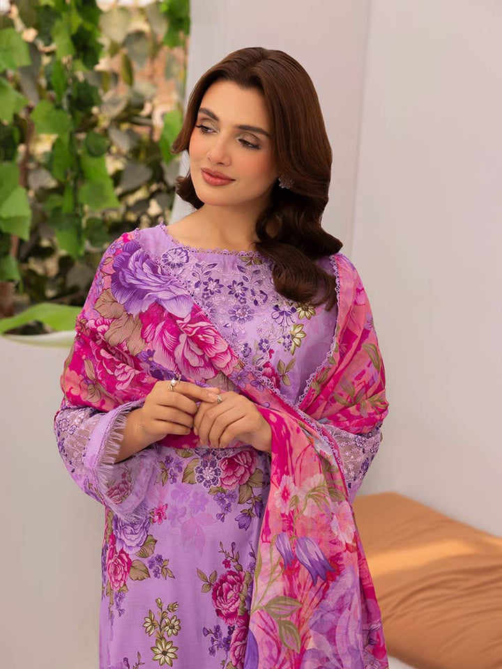 Discover the ZARIA Premium 3 Pieces Unstitched Lawn Suit, featuring digital printed lawn fabric with organza sequence embroidery. Perfect for festive occasions, this suit includes a shirt, trouser, and dupatta for a stylish and elegant look