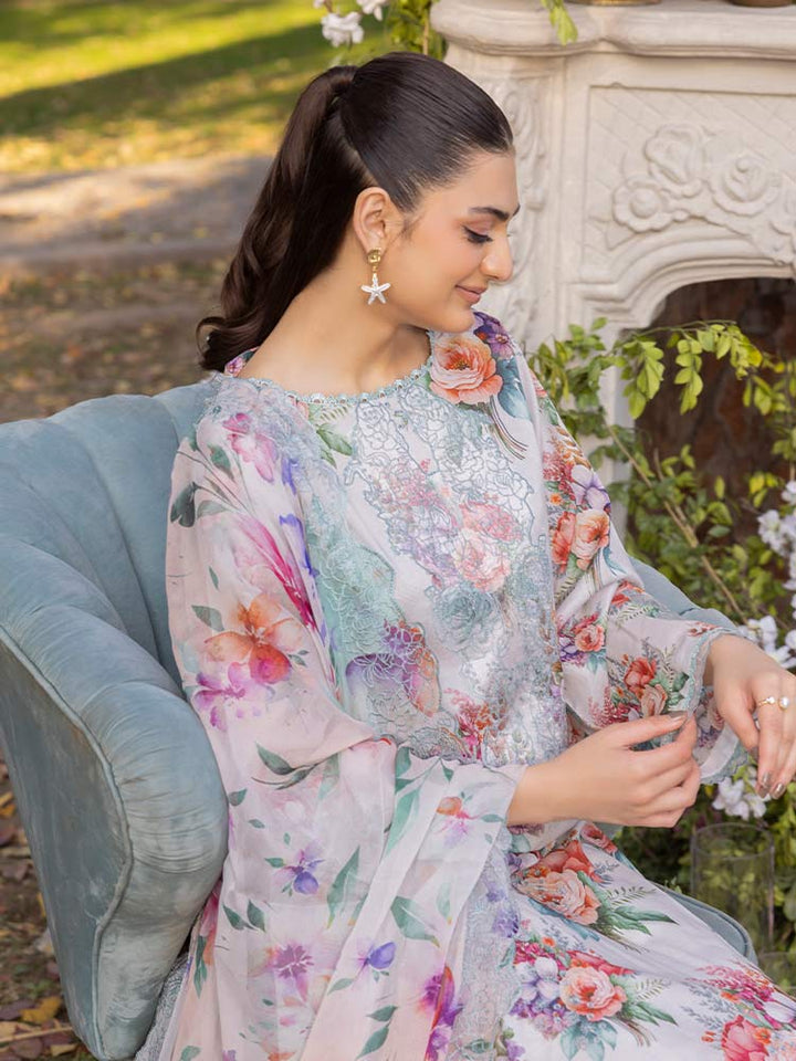 NAMAL 3 Pieces Unstitched Digital Printed Lawn Suit featuring a digital printed lawn shirt with organza embroidery, dyed cambric cotton trousers, and a bamber chiffon dupatta with embroidered cut-work details.