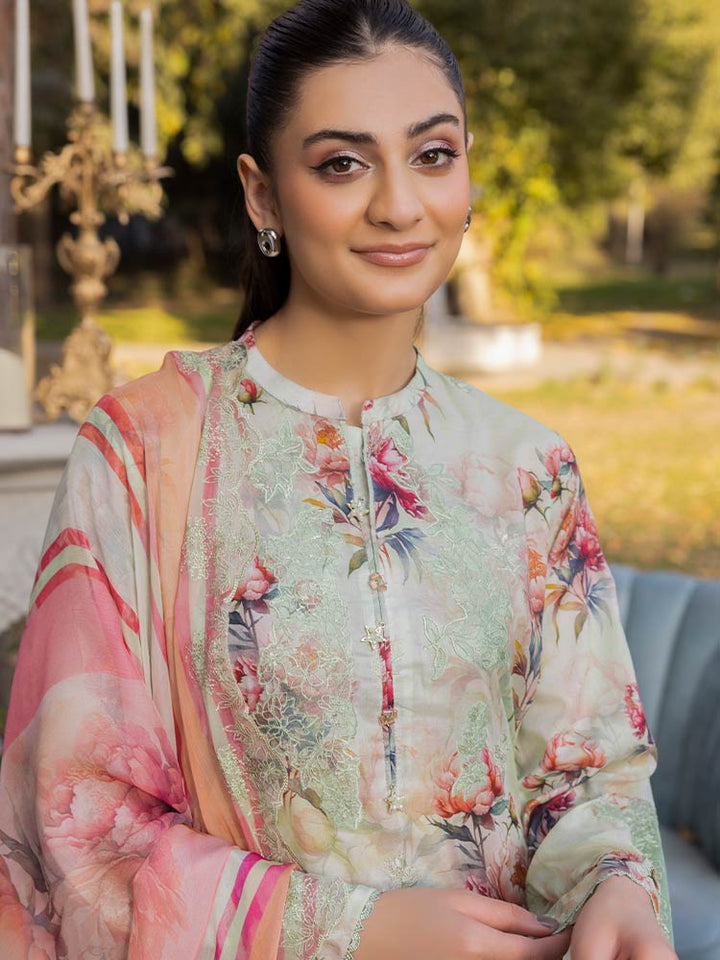 NAMAL 3 Pieces Unstitched Digital Printed Lawn Suit featuring a digital printed lawn shirt with organza embroidery, dyed cambric cotton trousers, and a bamber chiffon dupatta with embroidered cut-work details.