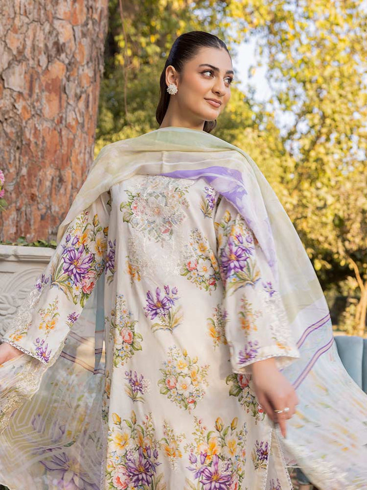 NAMAL 3 Pieces Unstitched Digital Printed Lawn Suit featuring a digital printed lawn shirt with organza embroidery, dyed cambric cotton trousers, and a bamber chiffon dupatta with embroidered cut-work details.