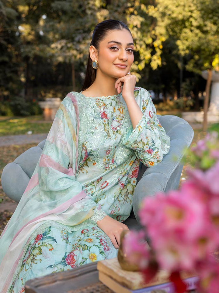 NAMAL 3 Pieces Unstitched Digital Printed Lawn Suit featuring a digital printed lawn shirt with organza embroidery, dyed cambric cotton trousers, and a bamber chiffon dupatta with embroidered cut-work details.