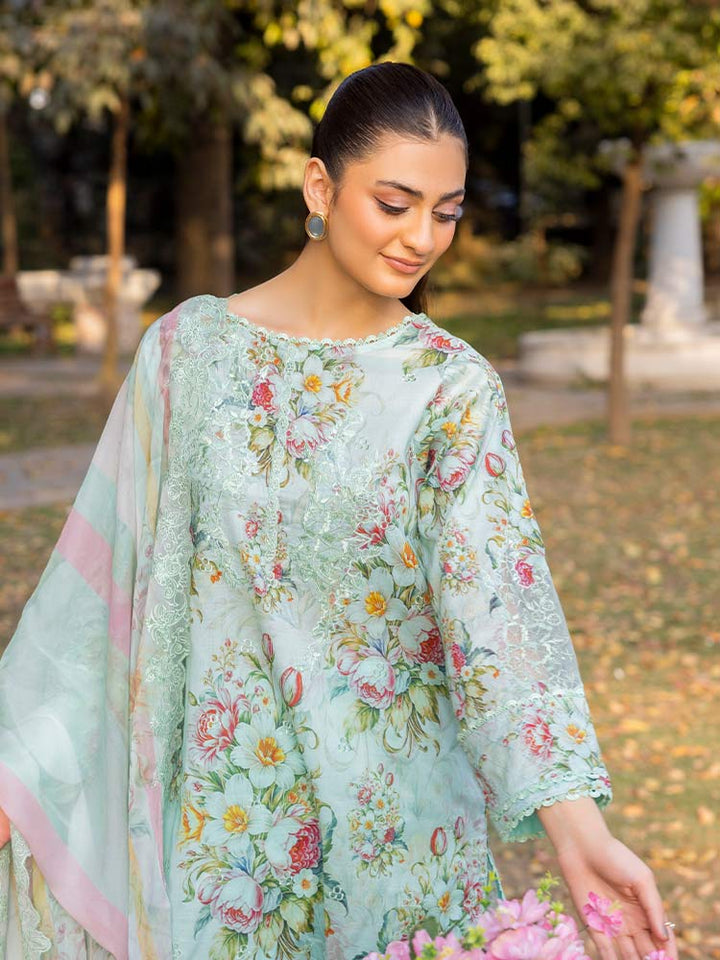 NAMAL 3 Pieces Unstitched Digital Printed Lawn Suit featuring a digital printed lawn shirt with organza embroidery, dyed cambric cotton trousers, and a bamber chiffon dupatta with embroidered cut-work details.