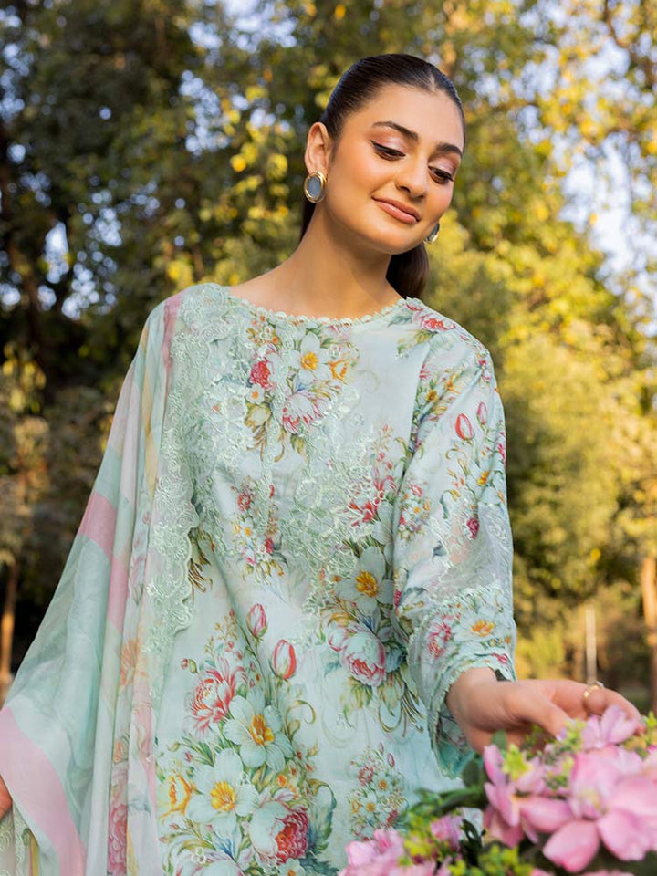NAMAL 3 Pieces Unstitched Digital Printed Lawn Suit featuring a digital printed lawn shirt with organza embroidery, dyed cambric cotton trousers, and a bamber chiffon dupatta with embroidered cut-work details.